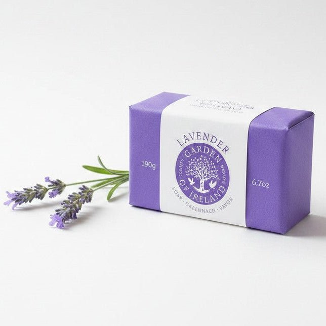 Bar of soap with a purple and white label on a white background